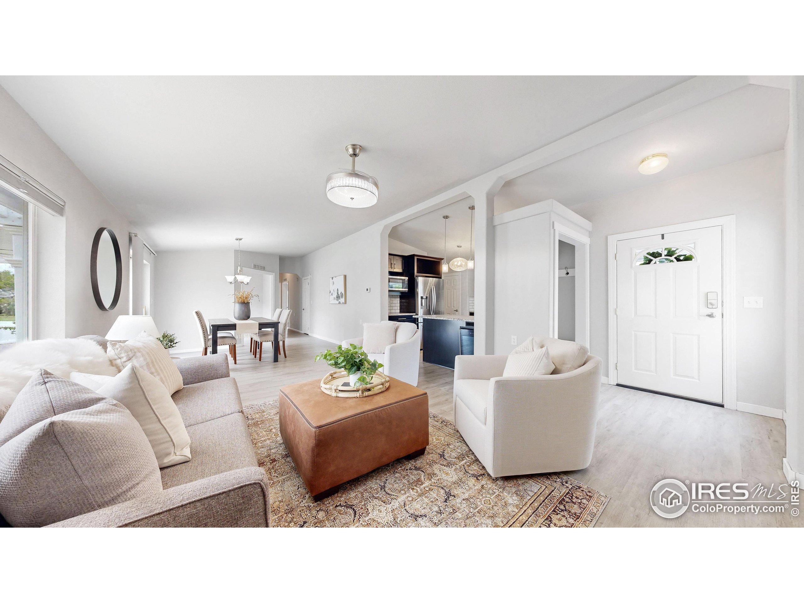 a living room with furniture and a table