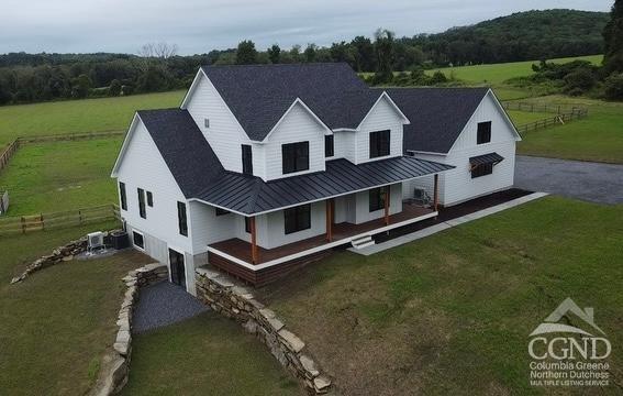 a aerial view of house with a garden