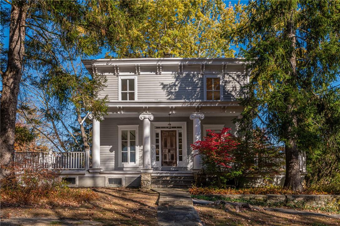 front view of house with a small yard