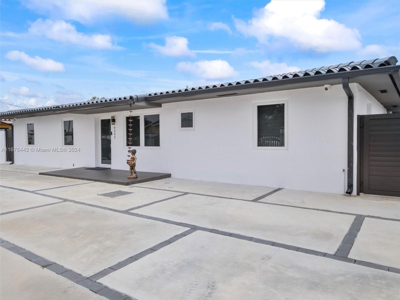 a view of a house with garage