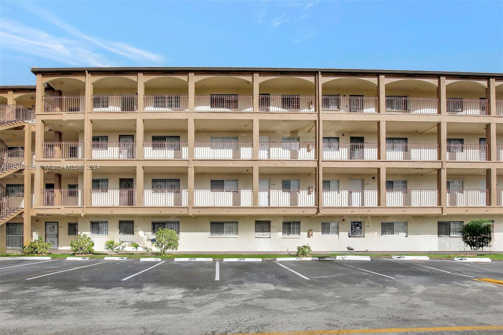 a front view of a building with street view