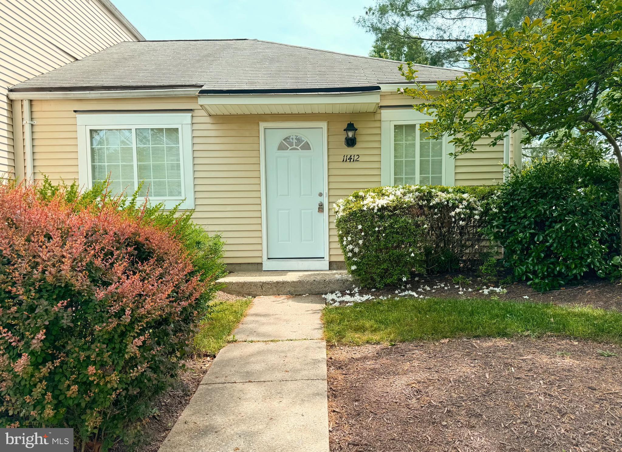 a front view of a house having yard