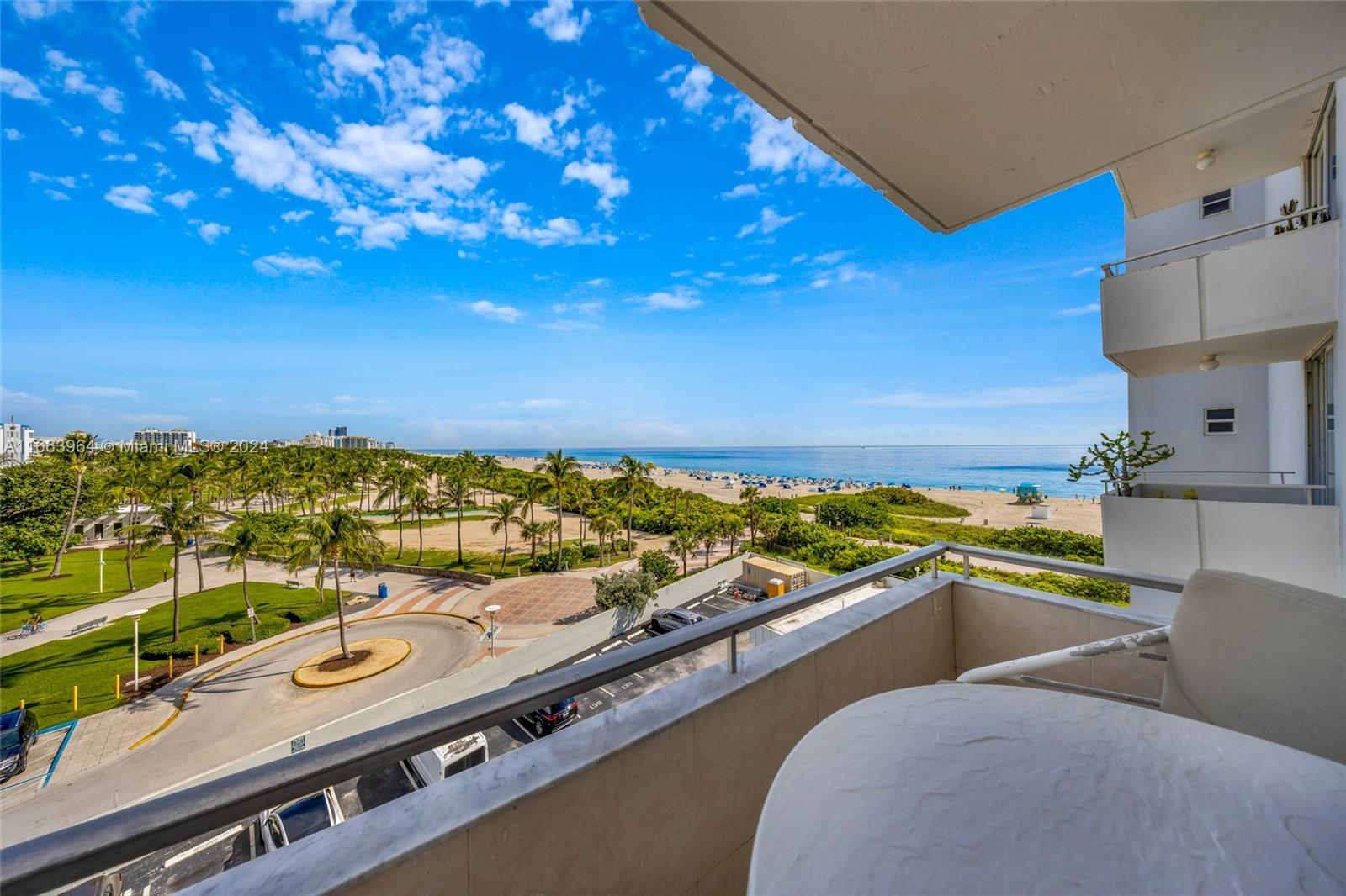 a view of a balcony with an ocean view