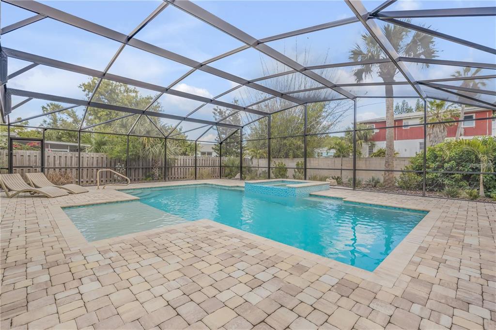 Heated pool with enclosure