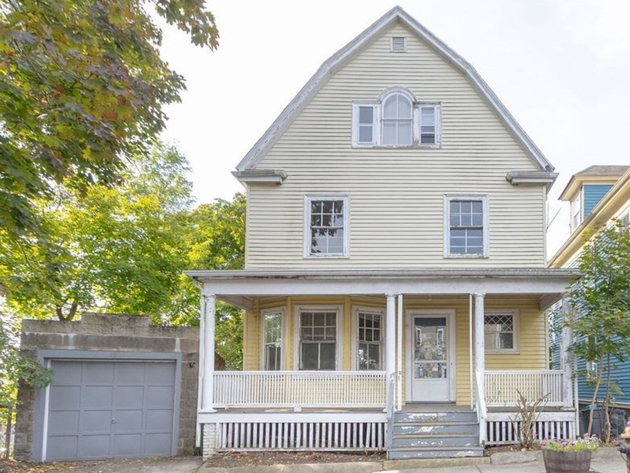 a front view of a house with a porch