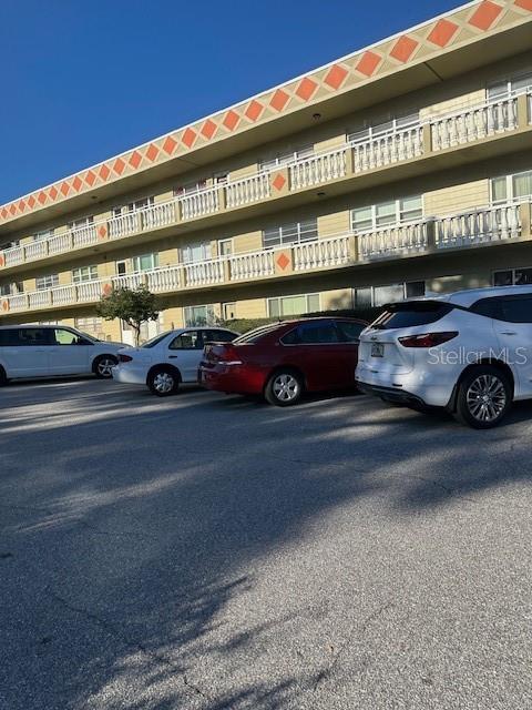 a car parked in front of a building