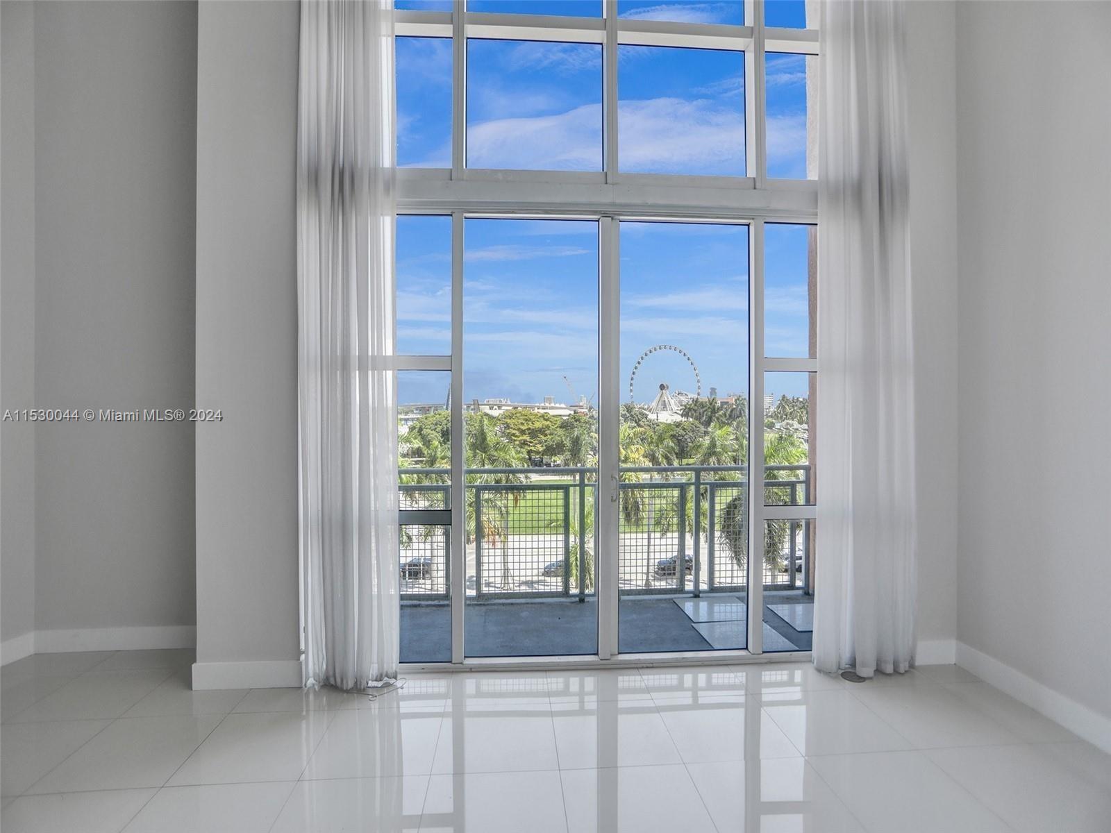 a view of a large window with an outdoor space