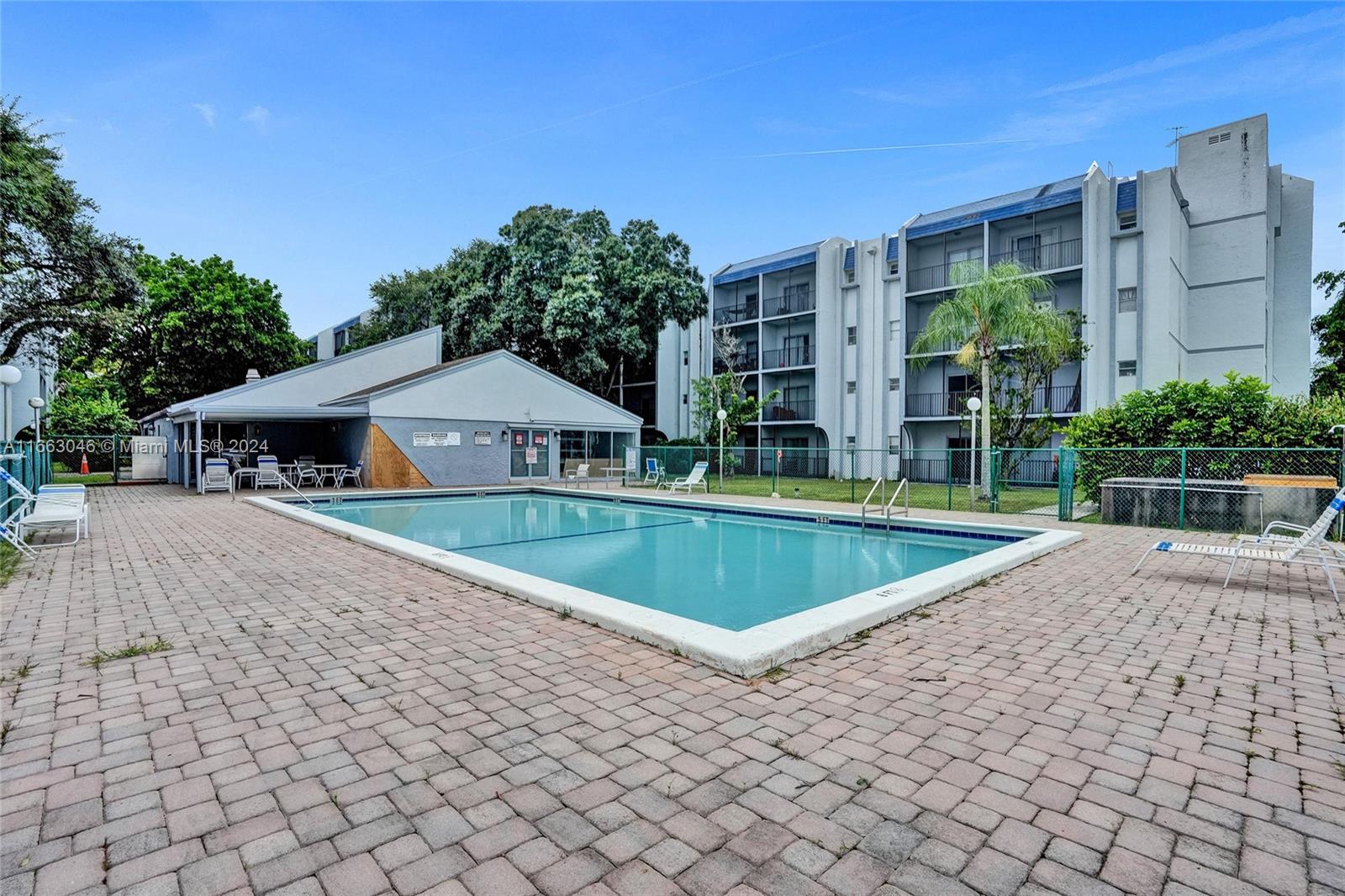 a view of a house with a swimming pool