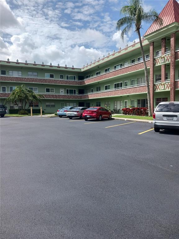 a view of car parked in front of building