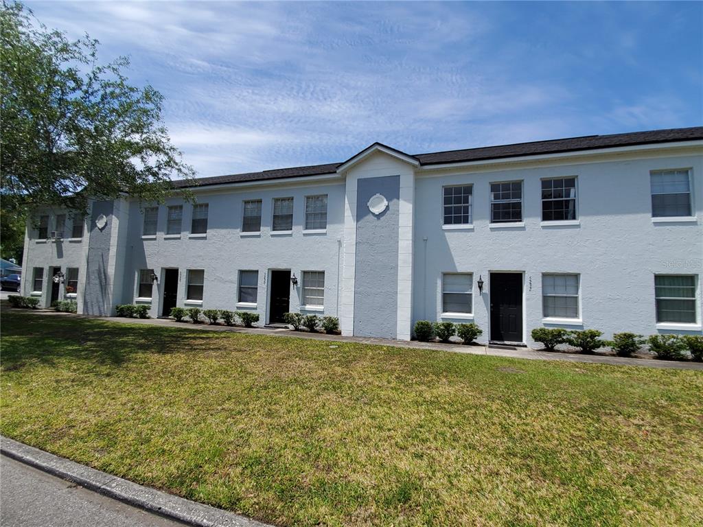 a front view of house with yard