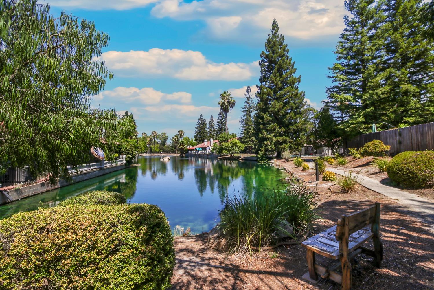 a view of a lake with a house