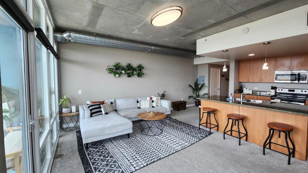 a living room with furniture and a table