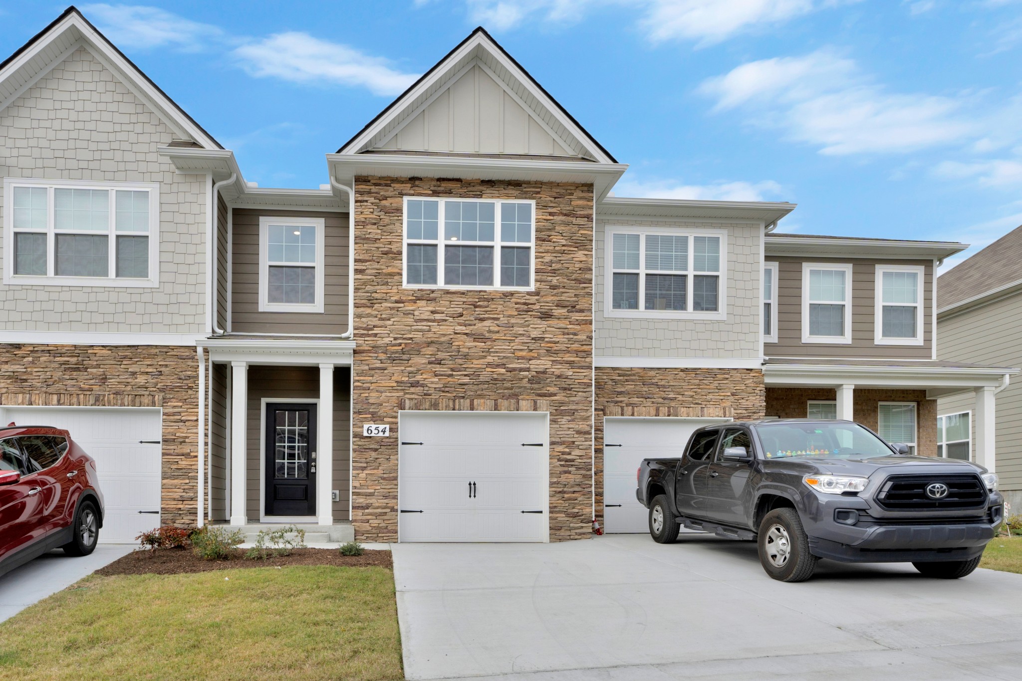 a car parked in front of a house