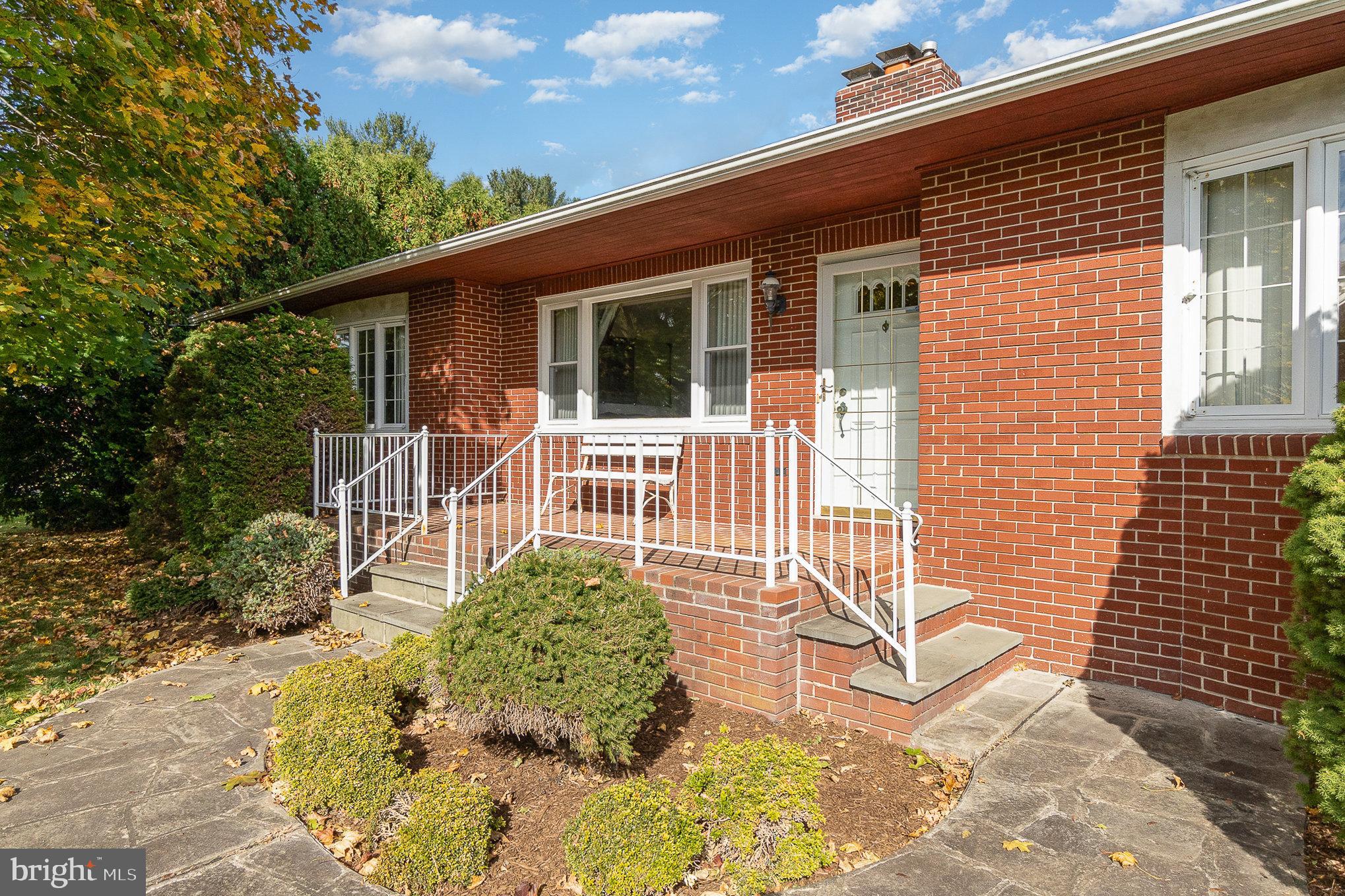 a house view with a garden space