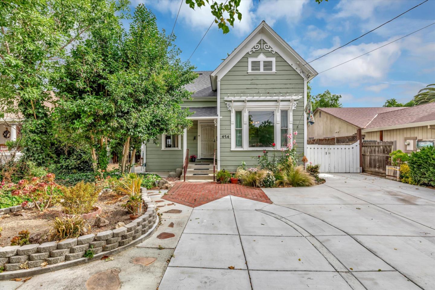 front view of a house with a small yard