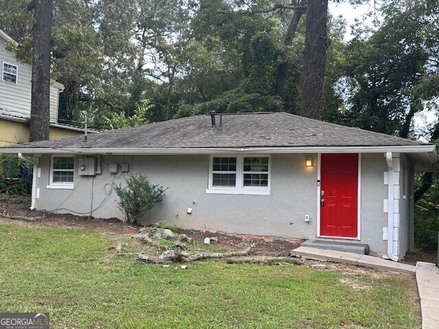 a front view of house with yard