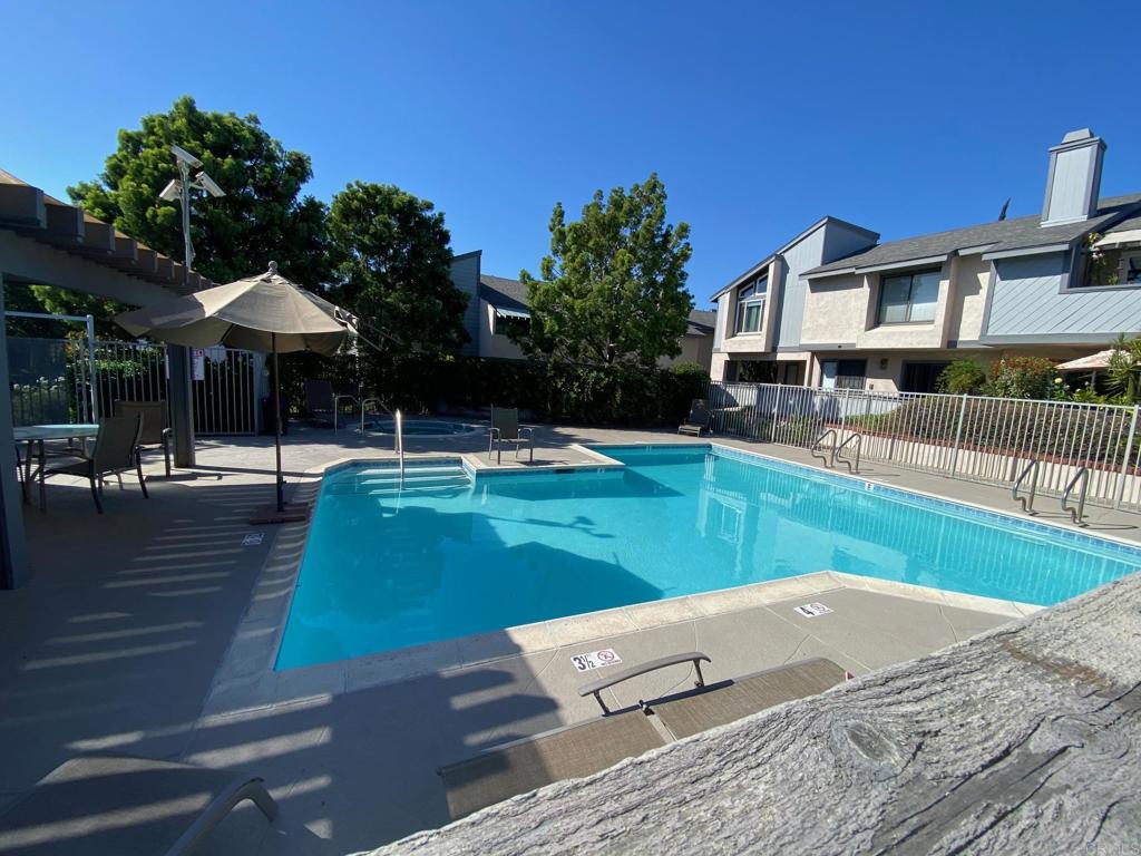 a view of a house with swimming pool