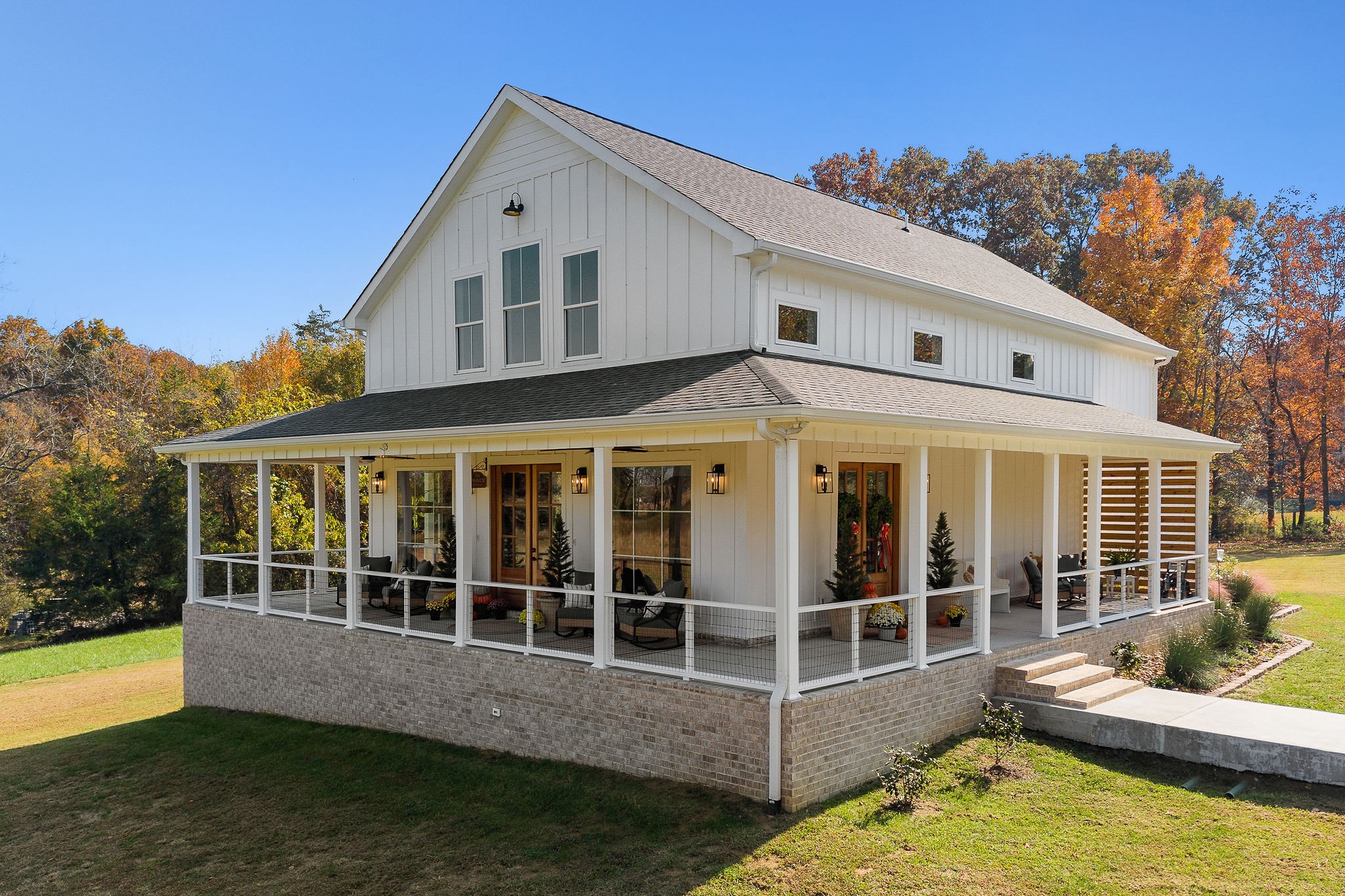 Stunning 4 BR/3.5 bath custom farmhouse with almost 13 acres!