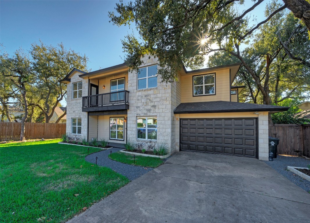 front view of a house with a yard