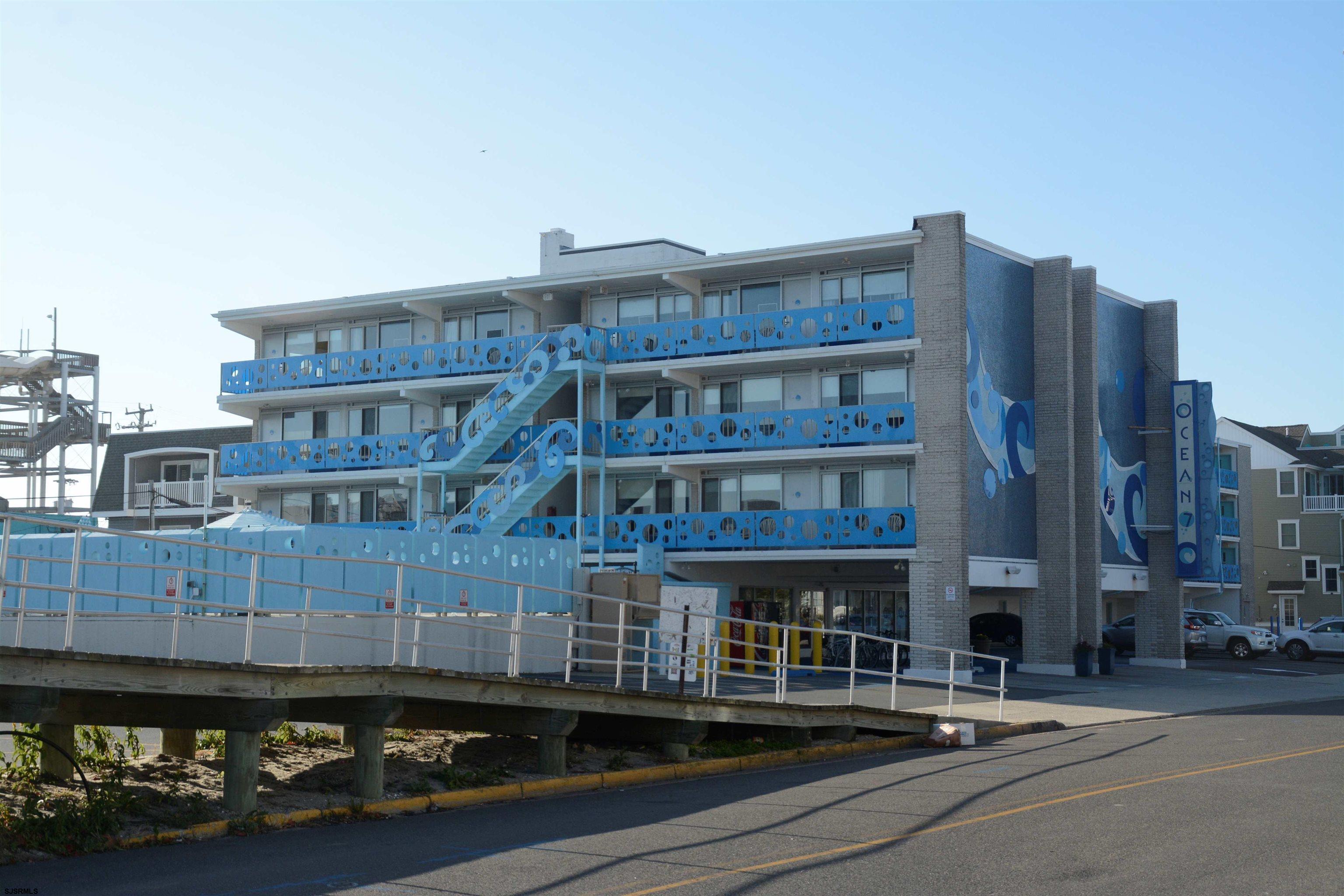 a front view of a building with glass windows