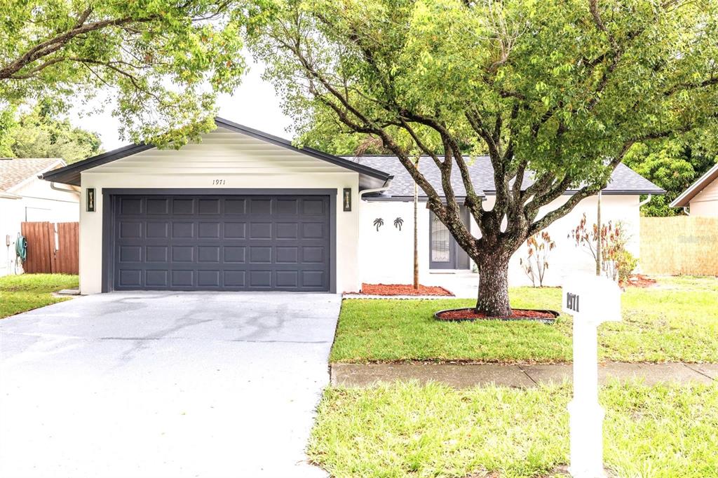 a front view of house with yard