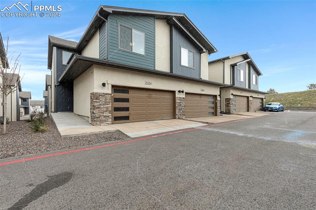 View of home's exterior with a garage