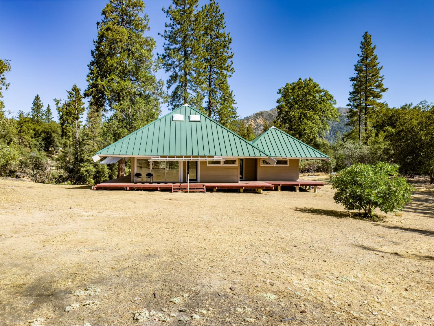 a house with trees in front of it