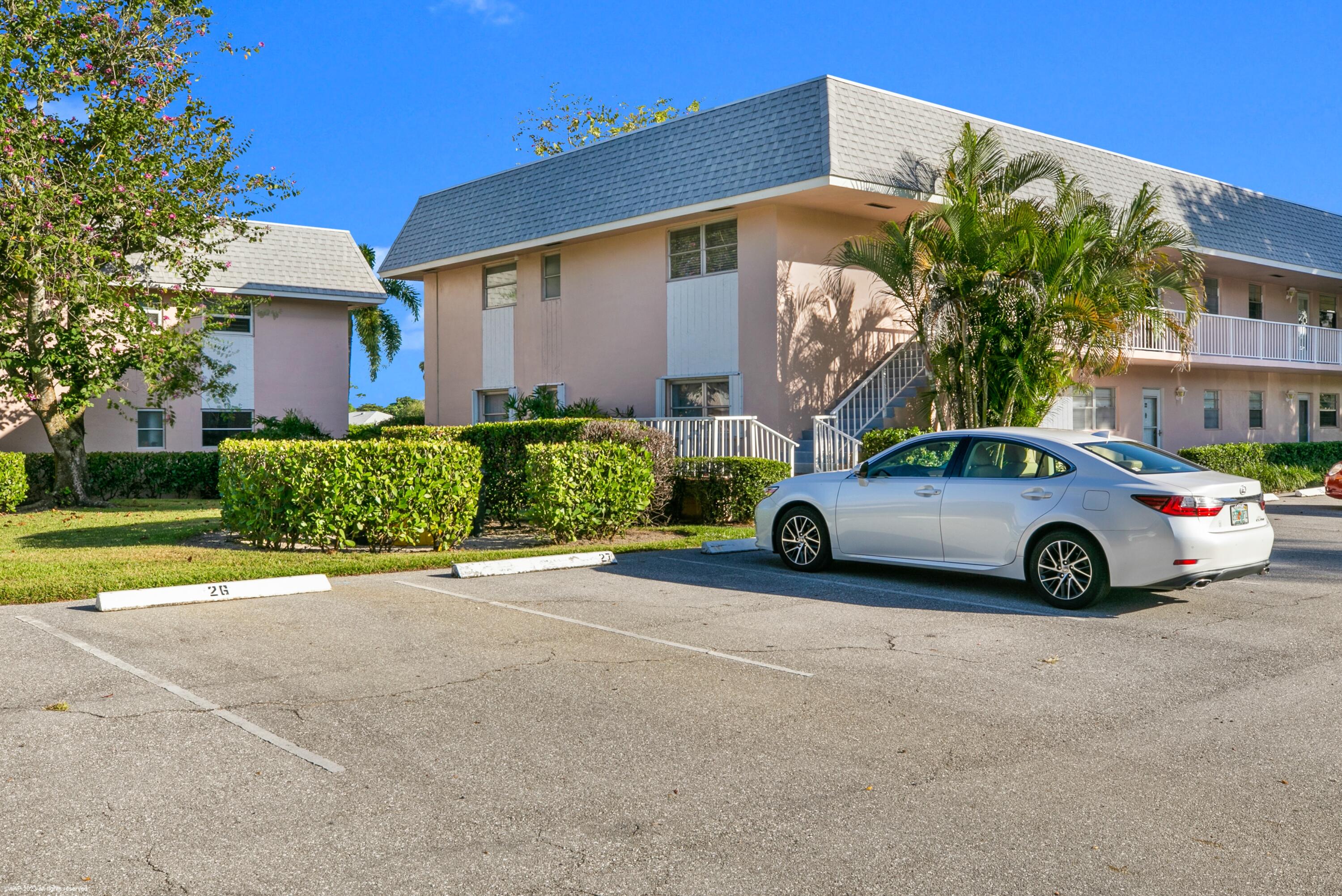 a car parked in front of a house