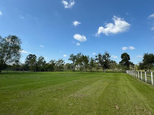 a view of a golf course with a garden