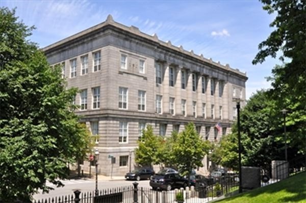 a view of a building with a garden