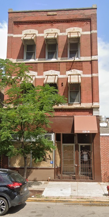 a view of a brick house with a window