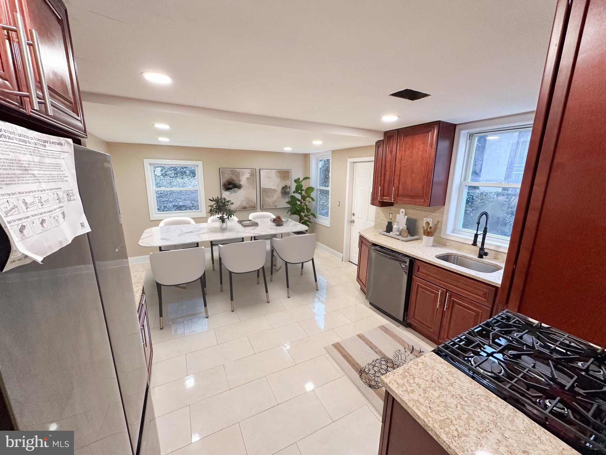 a kitchen with a sink and wooden cabinets