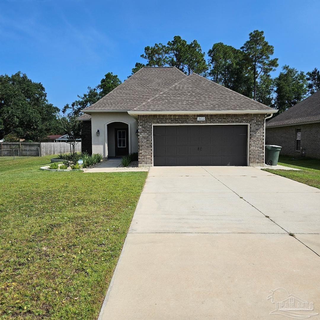 a front view of house with yard