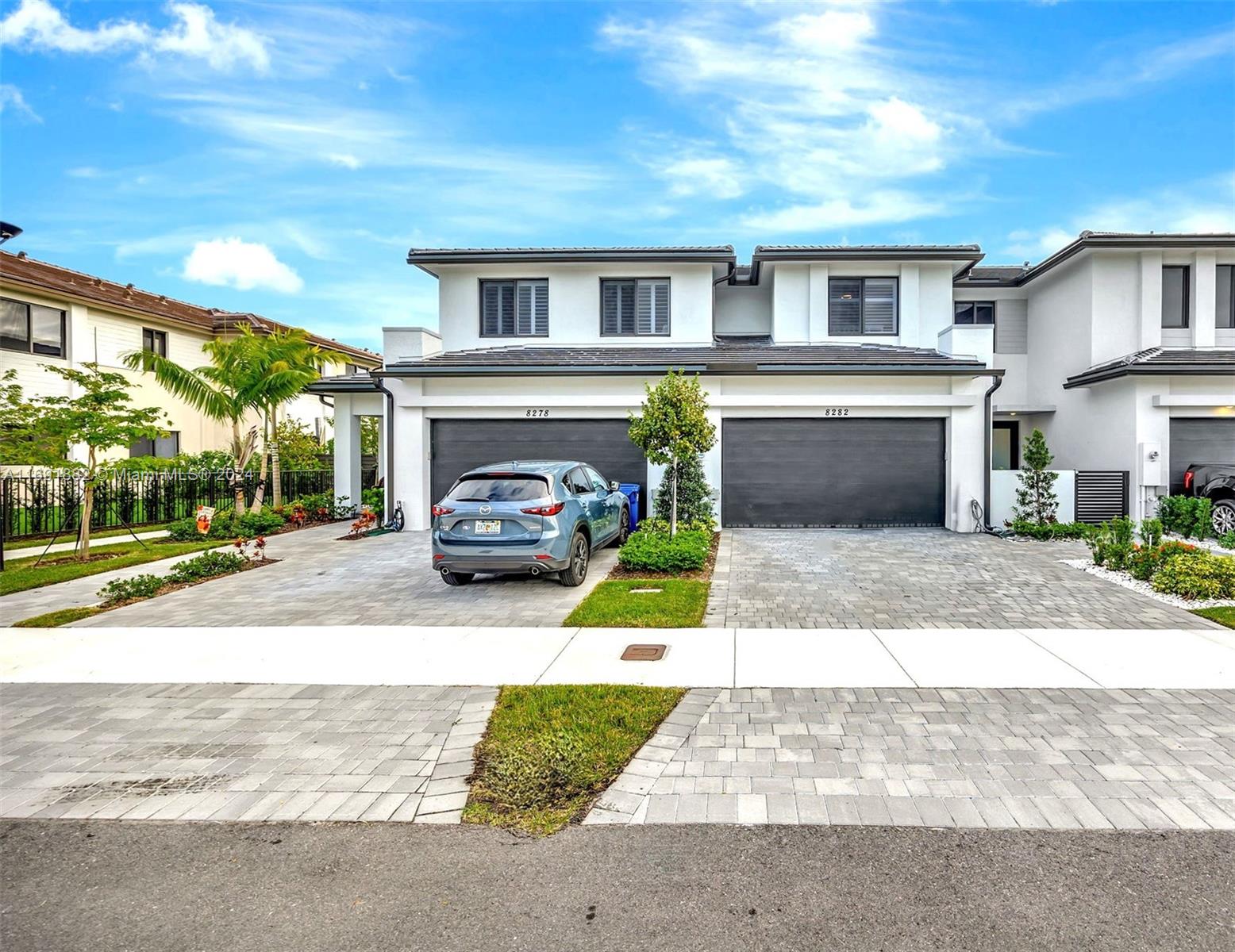 a house view with a garden space