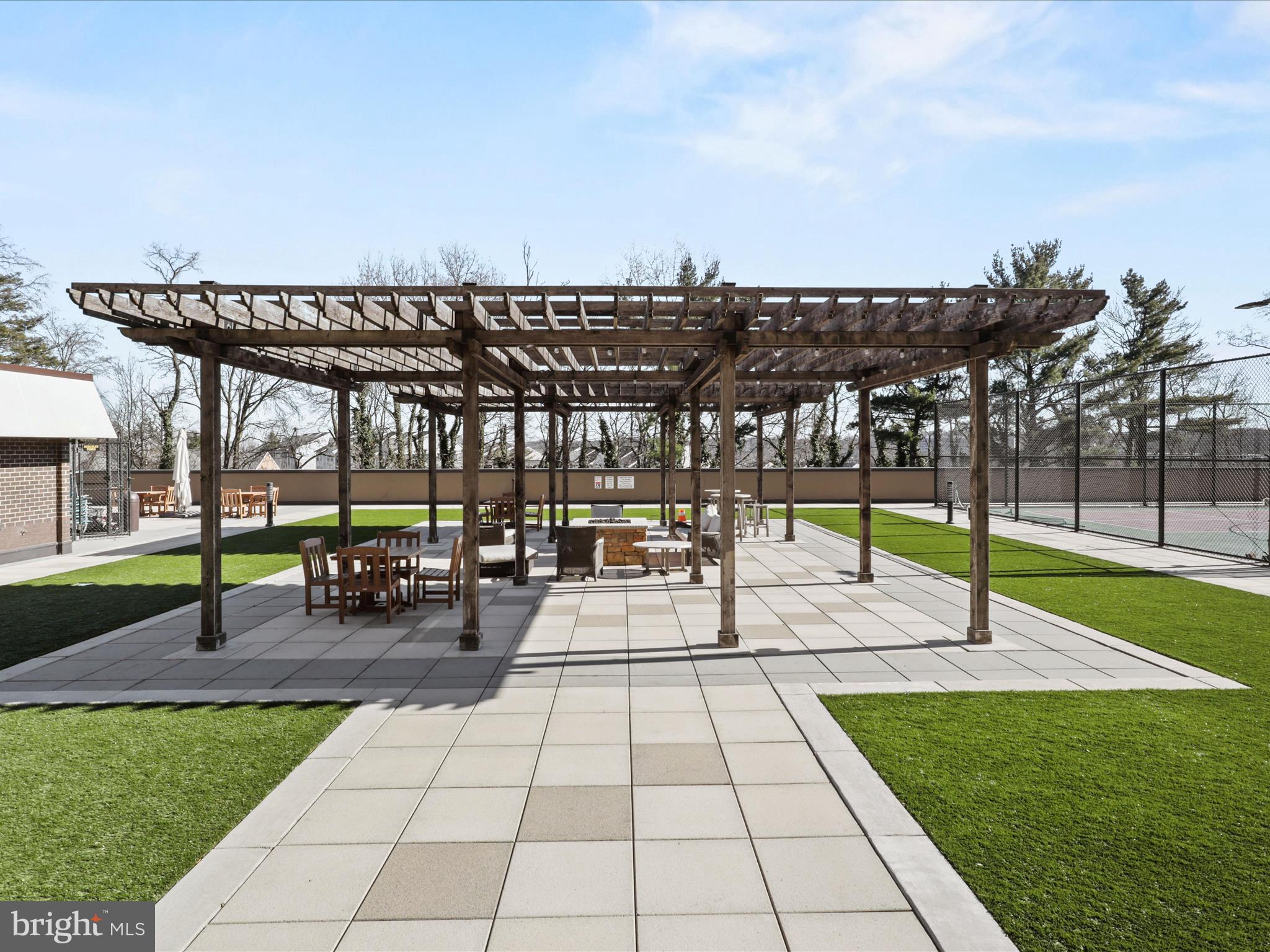 a view of a swimming pool with a patio