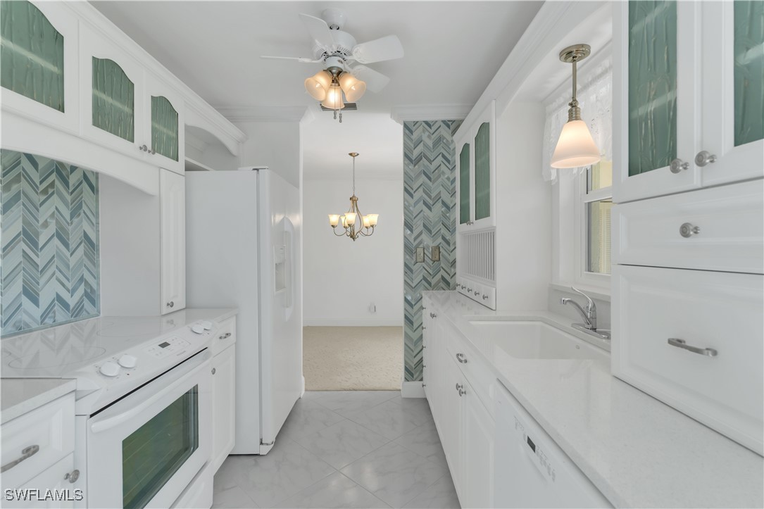 a bathroom with a sink a toilet and bathtub