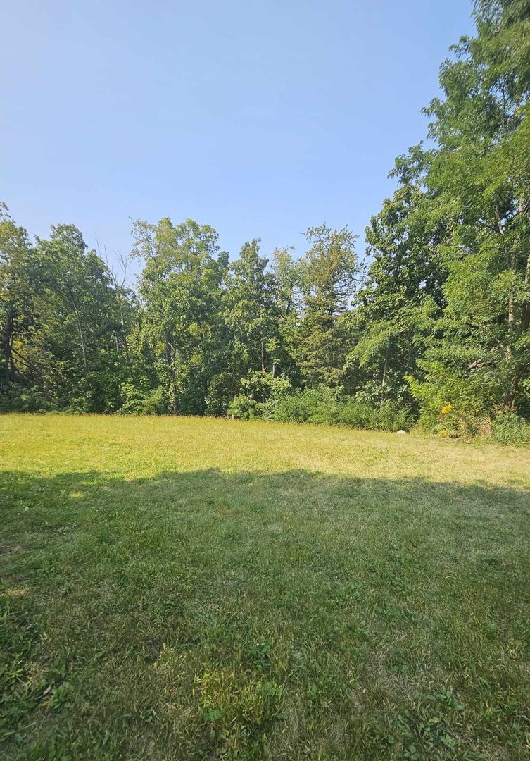 a view of outdoor space with mountain view