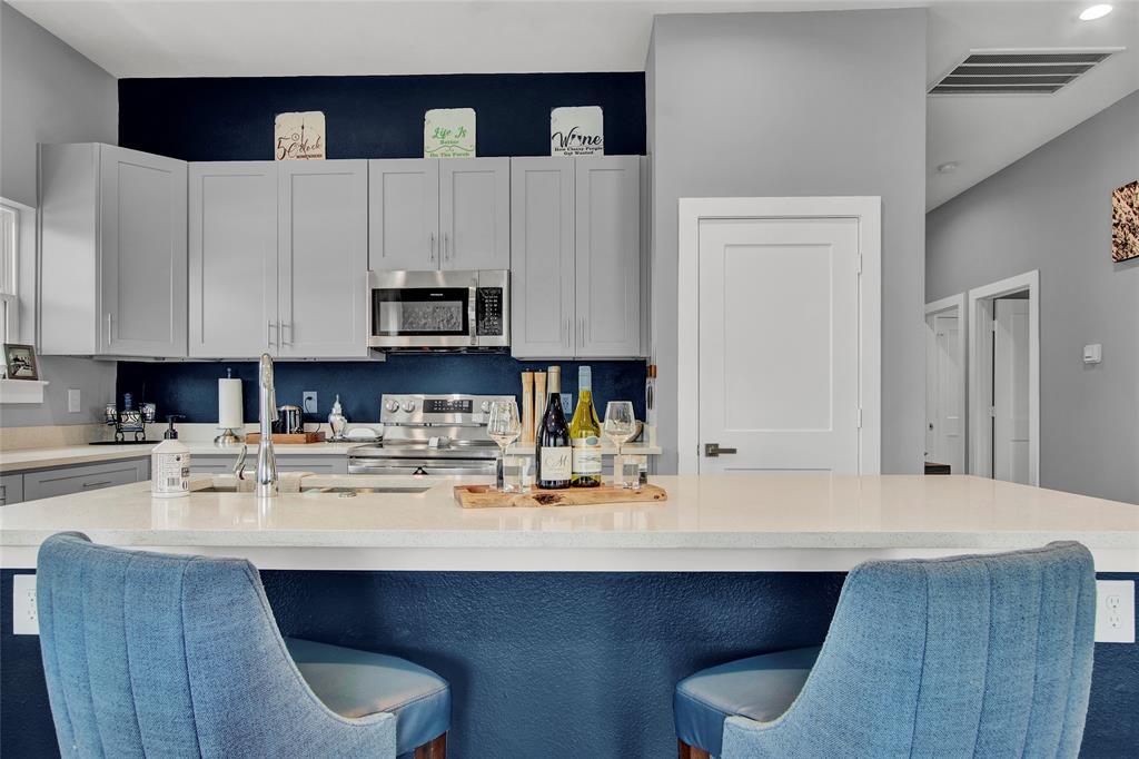 Another view showing the nice clean cabinets and Quartz counters.