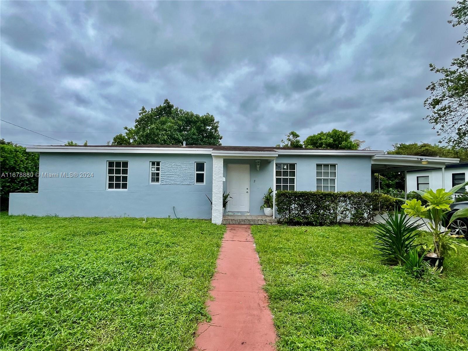 front view of house with a yard