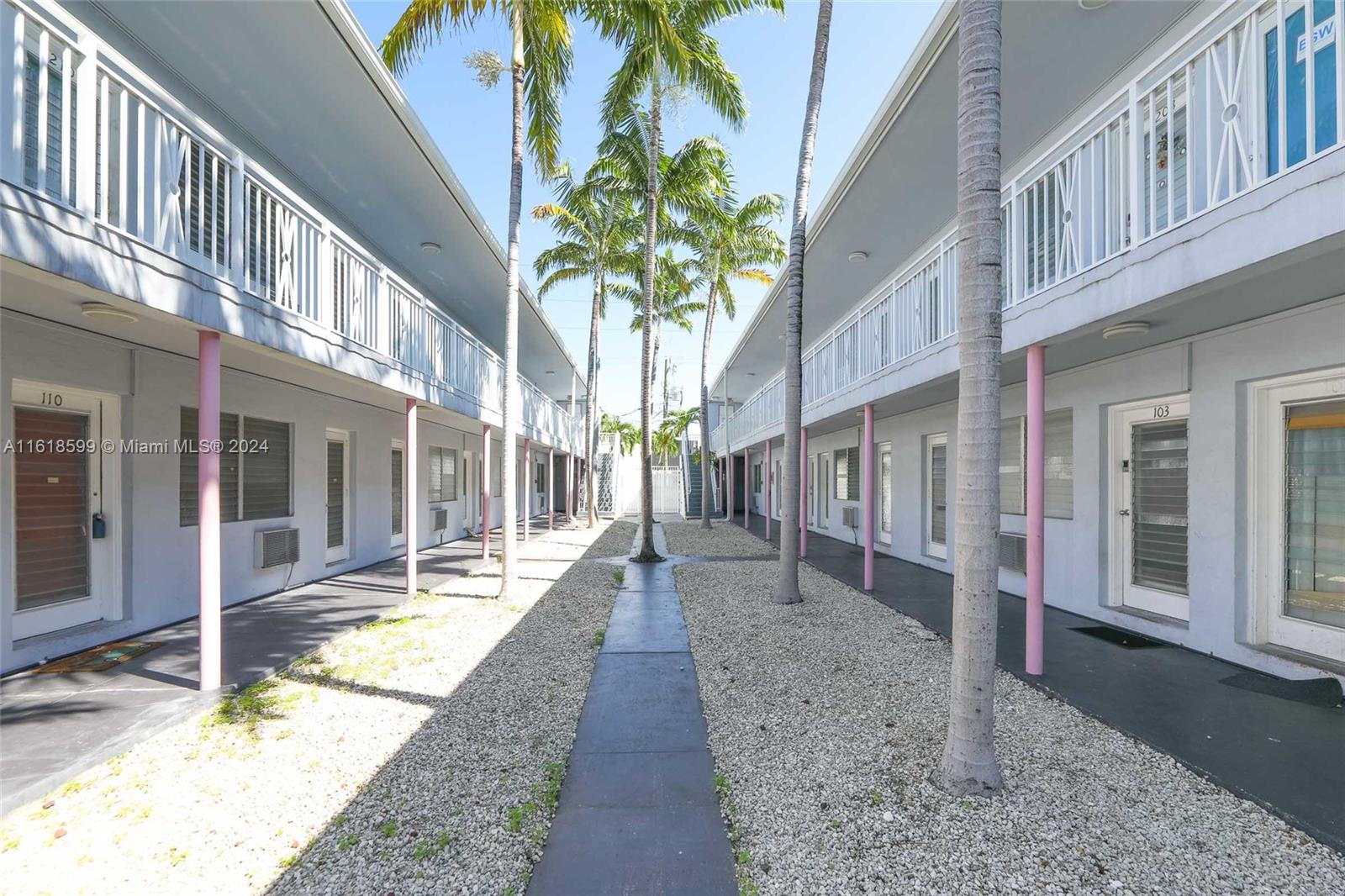 a view of a building with a street