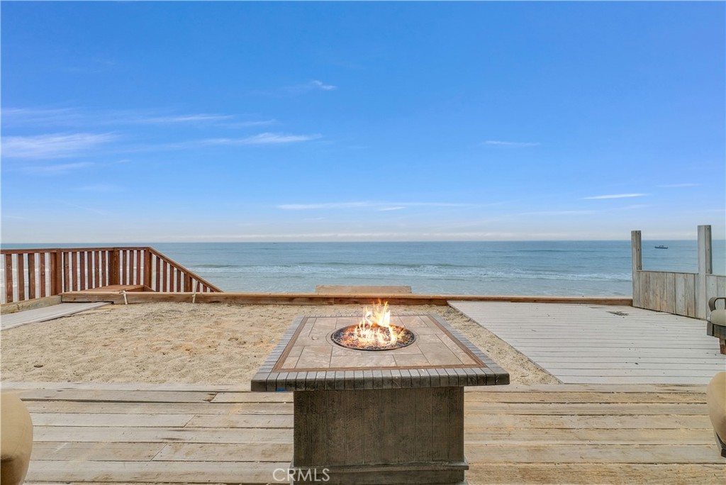 a view of swimming pool with outdoor seating