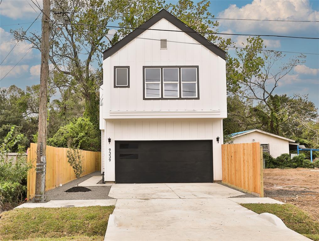 a front view of a house with yard