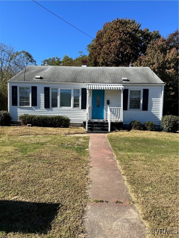 a front view of house with yard