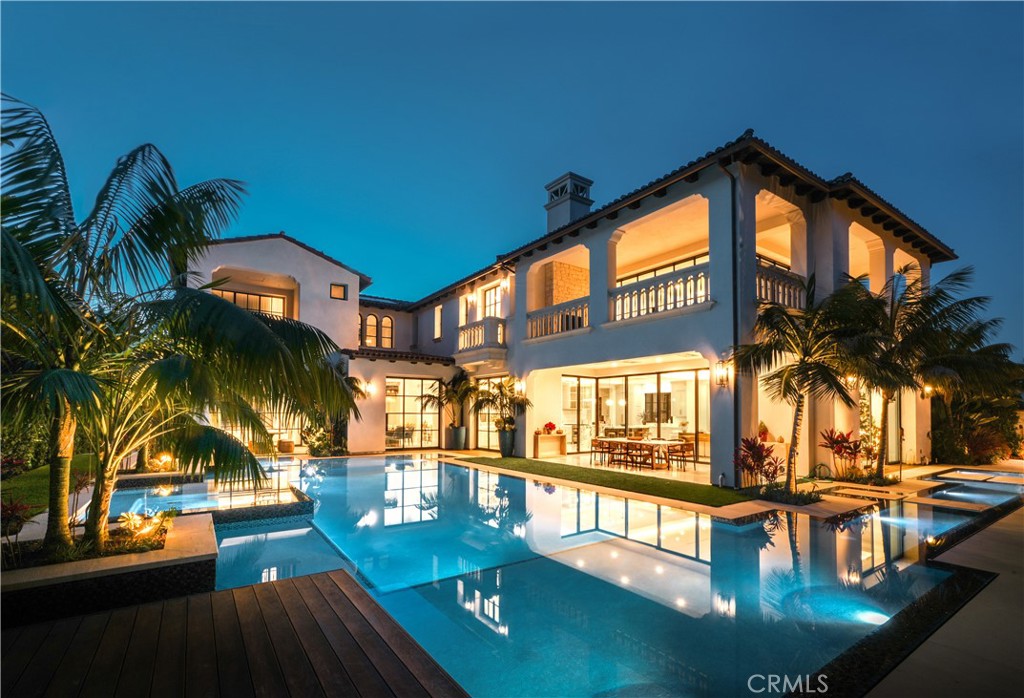 a view of swimming pool with outdoor seating