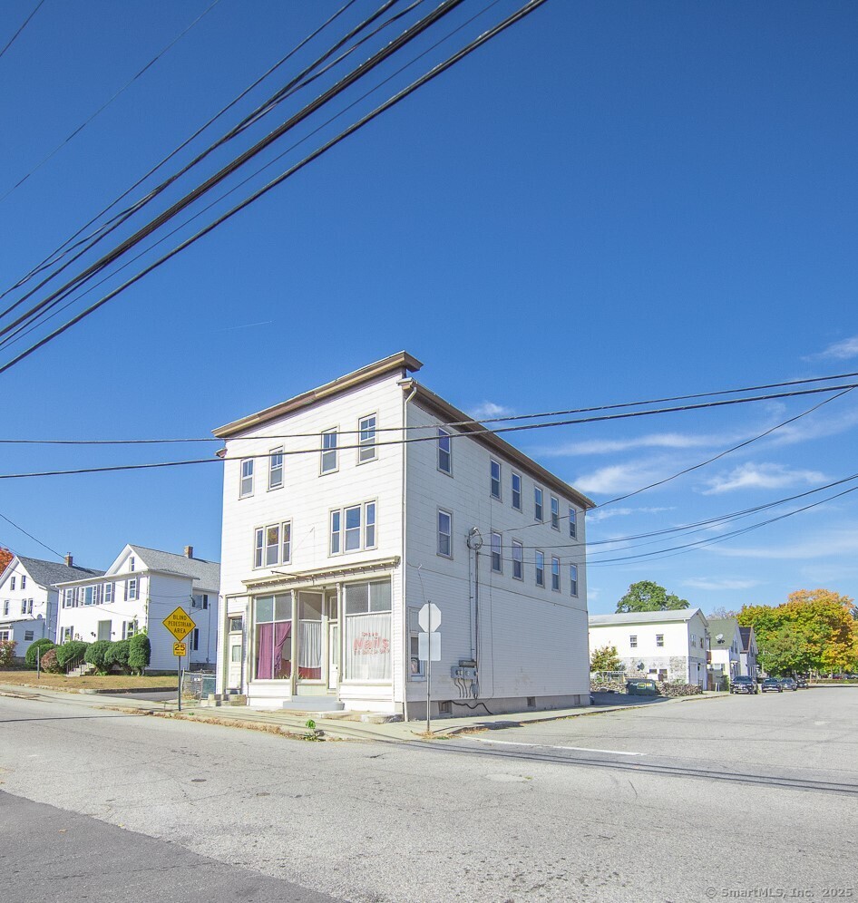 a front view of a building with street