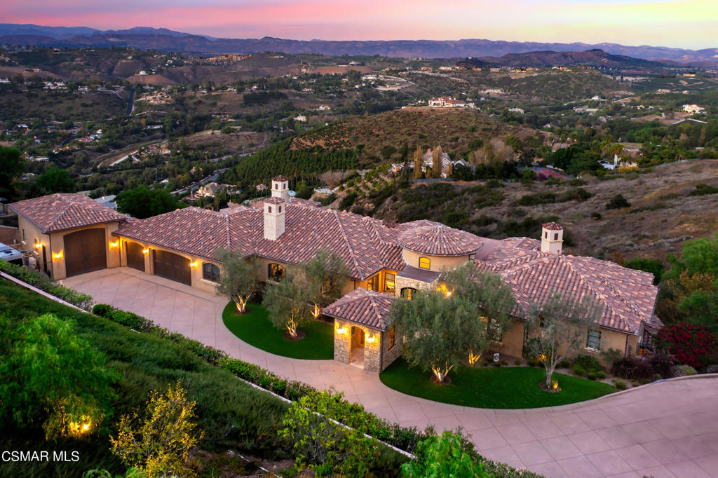 an aerial view of residential houses and outdoor space