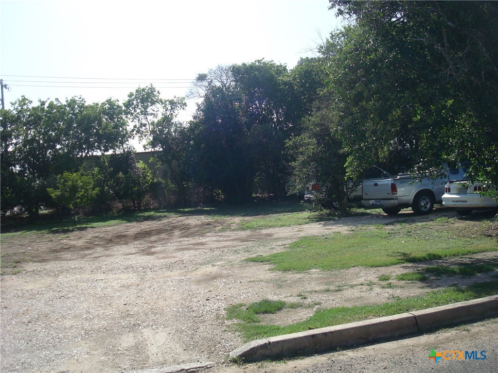 a view of backyard with outdoor space