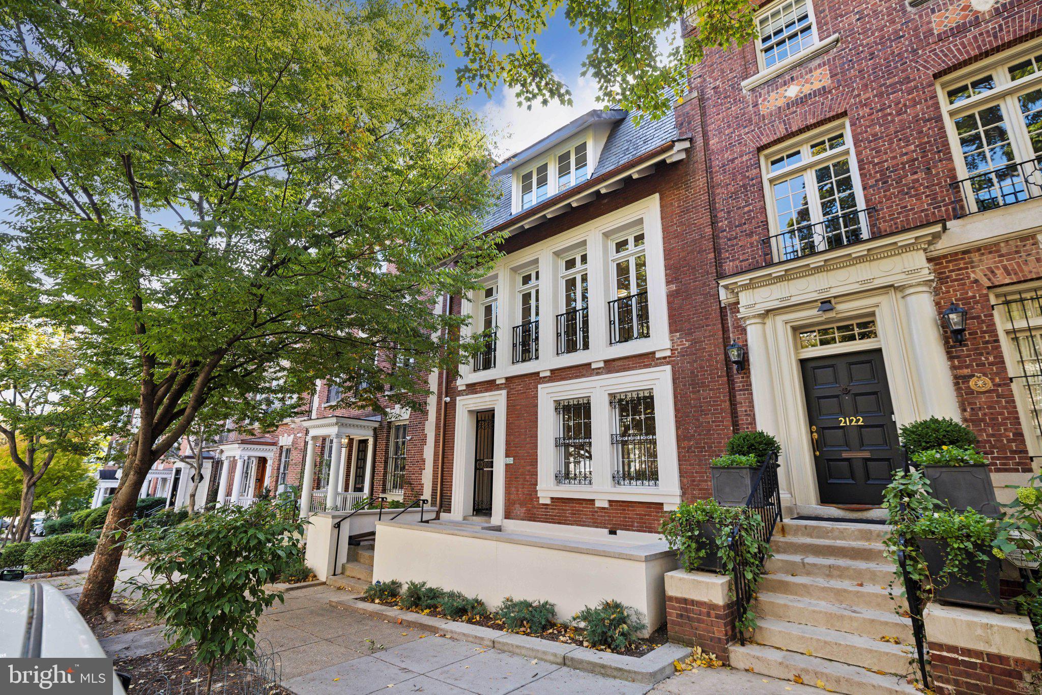 a front view of a multi story residential apartment building