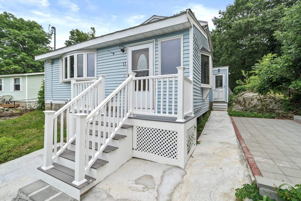 front view of a house with a deck