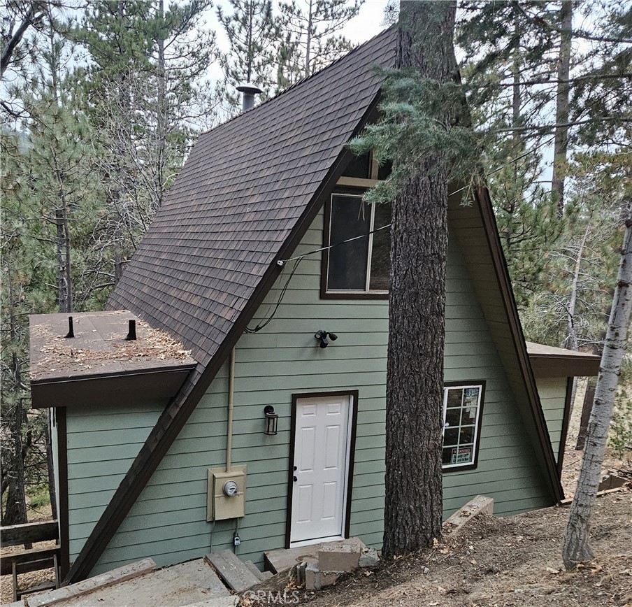 a front view of a house with garage